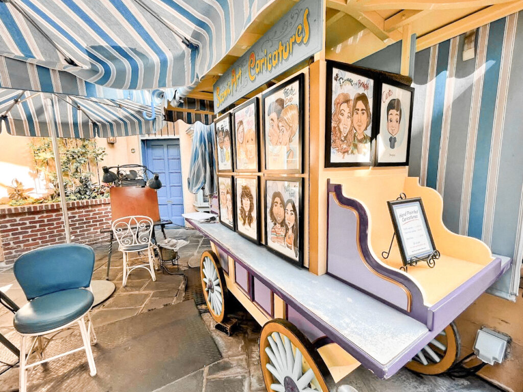 Rubio Arts caricature, portrait, and scenic art cart at Disneyland