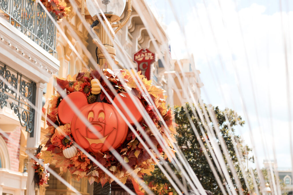 Halloween decor at Magic Kingdom seen through Rubio Arts balloons strings