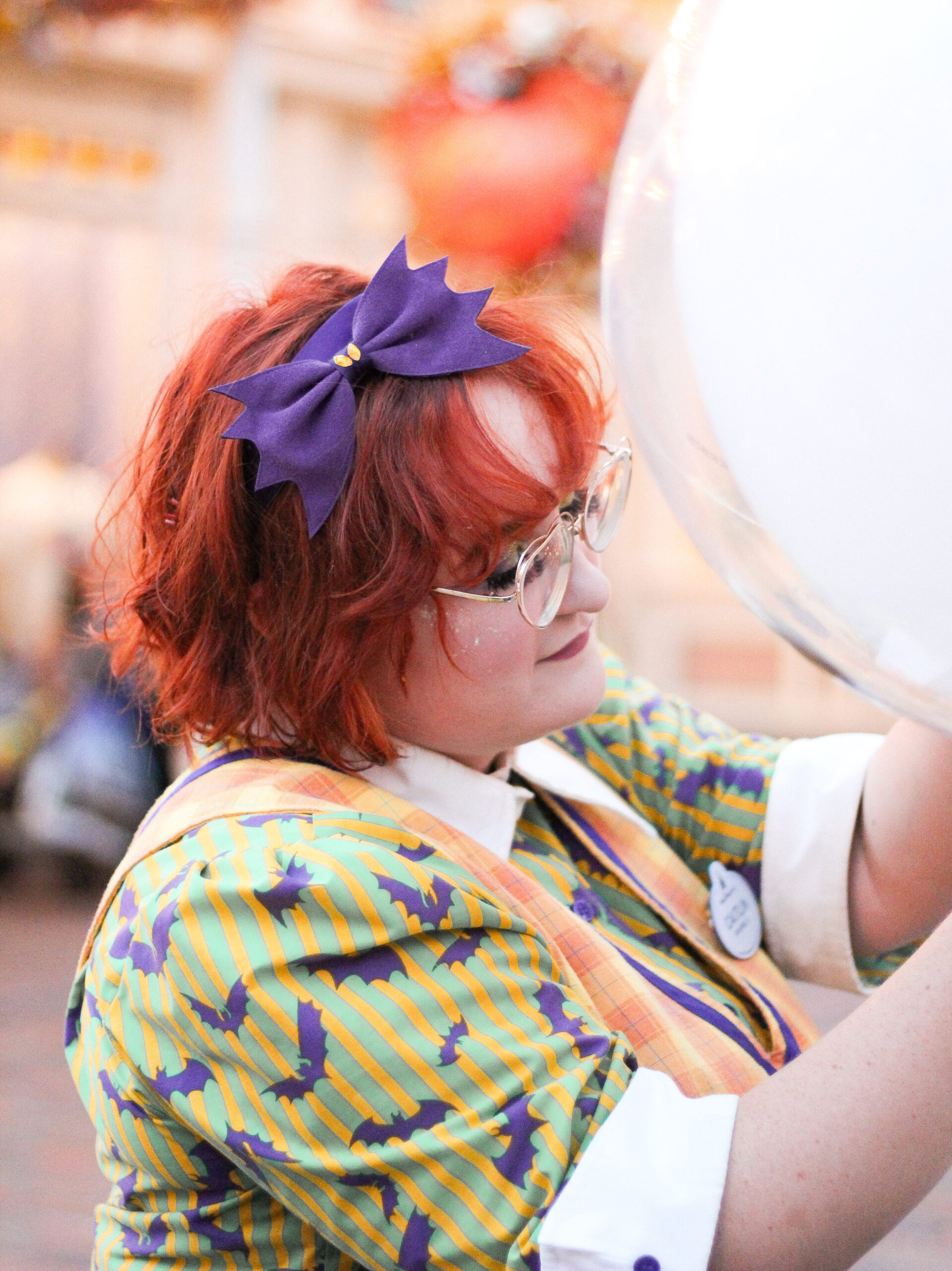 Walt Disney World balloon vendor at Magic Kingdom selling Halloween balloons