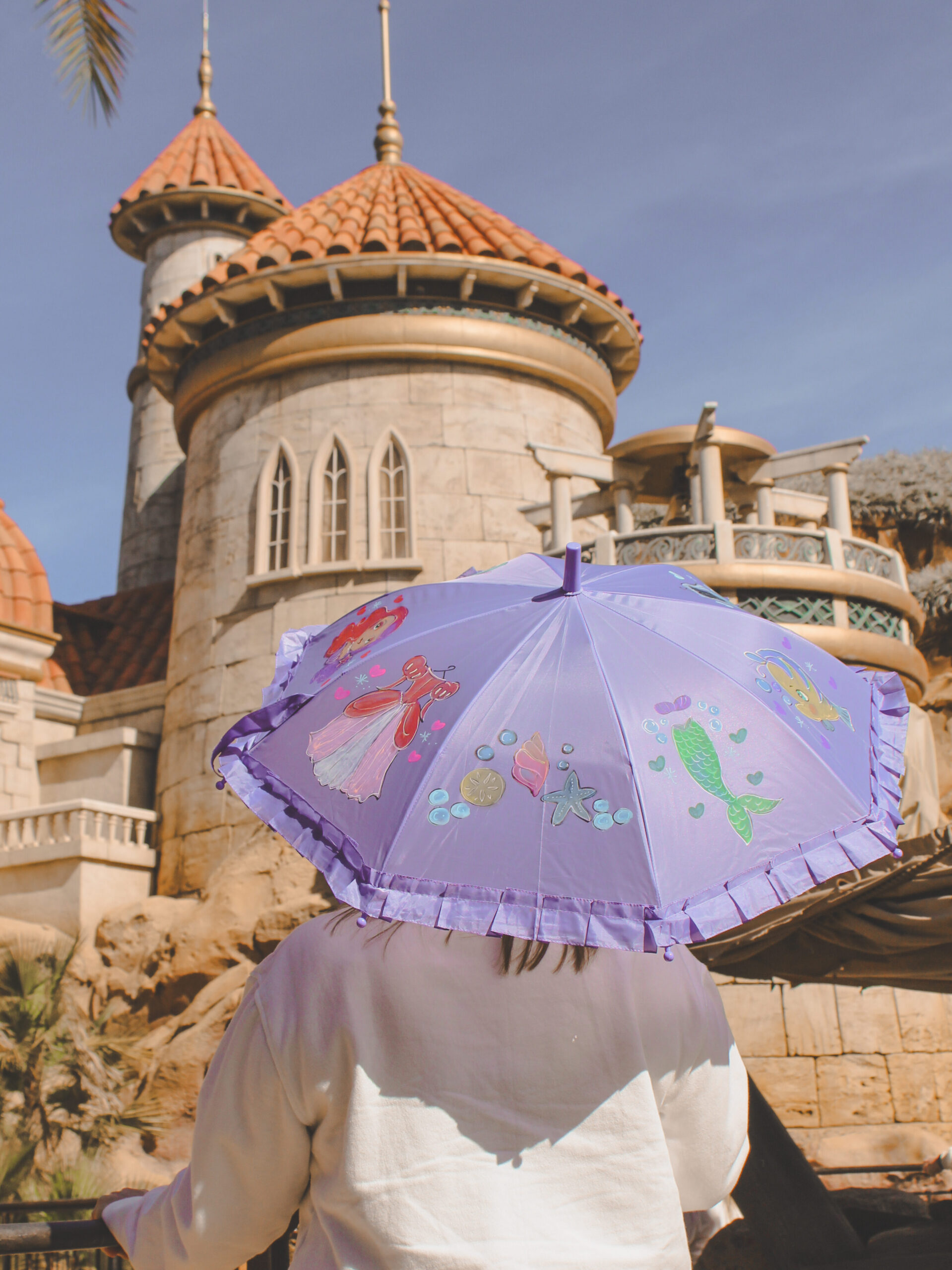 A Magic Kingdom parasol inspired by The Little Mermaid