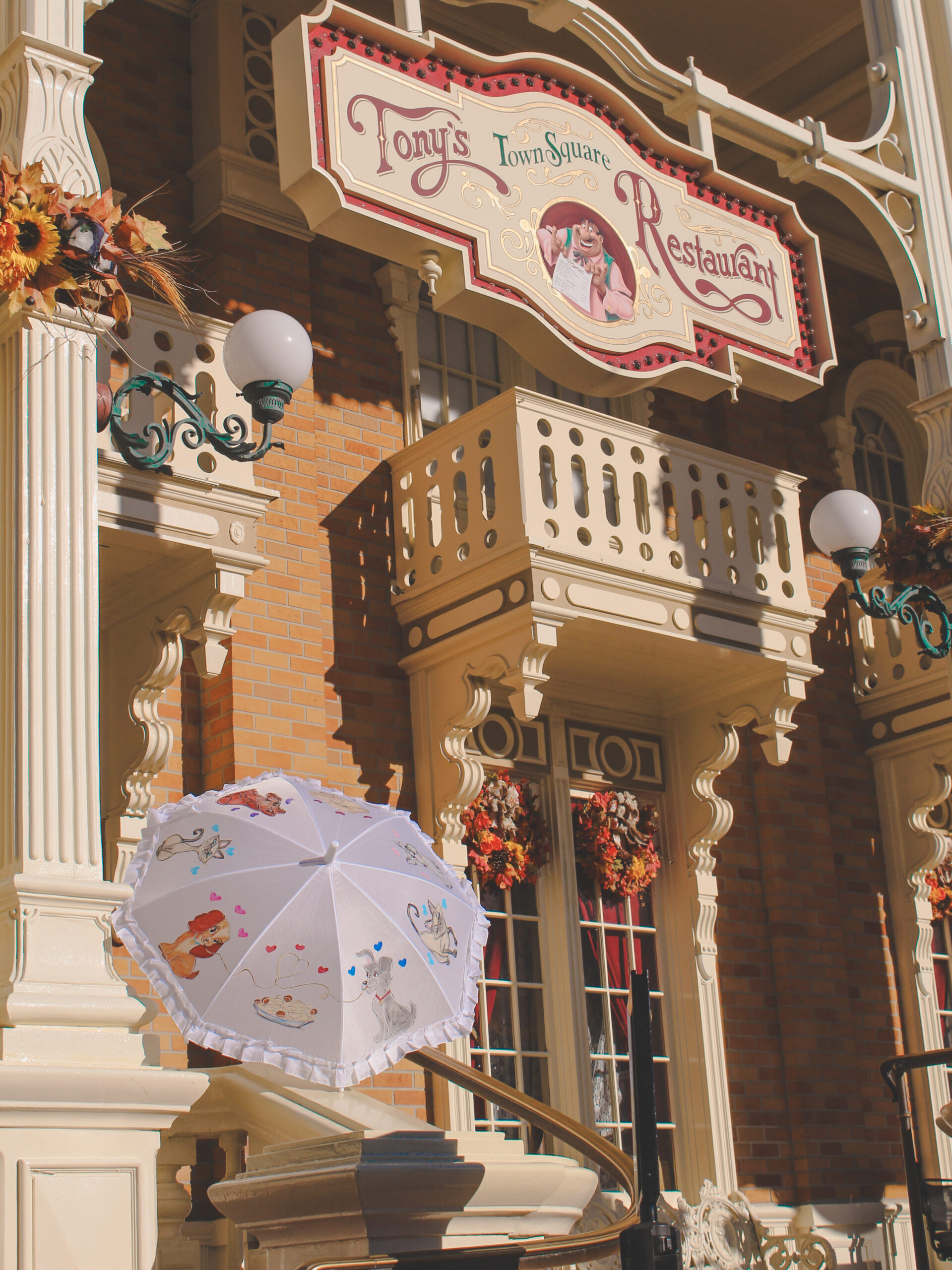 Lady and the Tramp parasols at Tony's Town Square Restaurant at Magic Kingdom at Walt Disney World